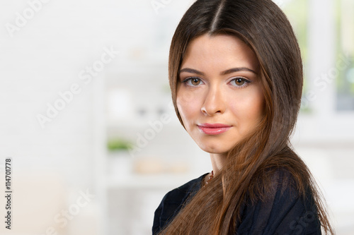 Beautiful young woman face closeup