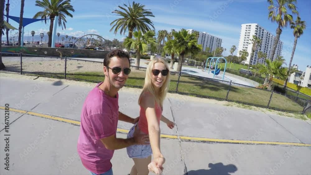 Couple roller skating