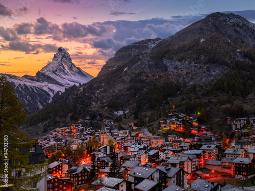 Sunset over old town of Zermatt with Mount Matterhorn in background