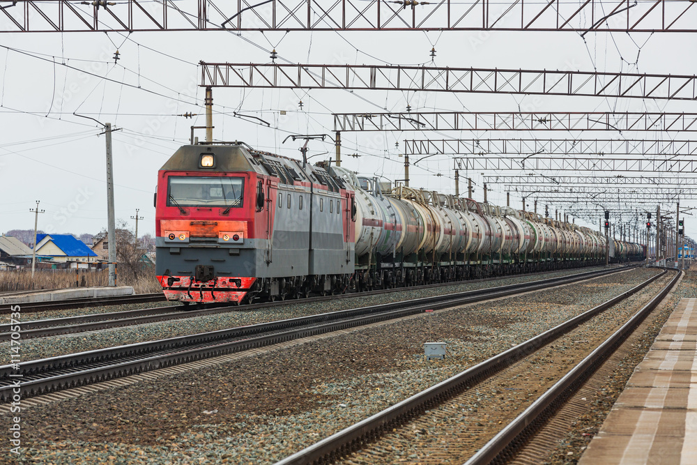 Obraz premium Freight train with tank cars for transportation of petroleum products. The TRANS-Siberian railway. Western Siberia.