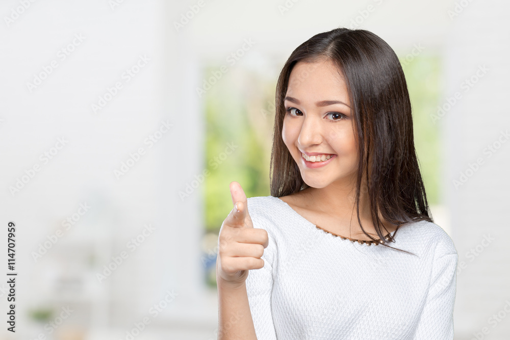 Young beautiful happy caucasian woman pointing on you Young beautiful happy caucasian woman pointing on you