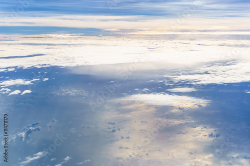 Fototapeta Naklejka Na Ścianę i Meble -  Aerial view from an airplane on a cloudy day.