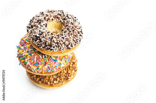 various donuts on white background