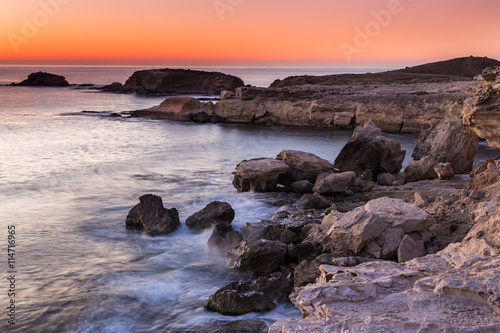 Sunrise on the coast of Escullos. Natural Park of Cabo de Gata. Spain.