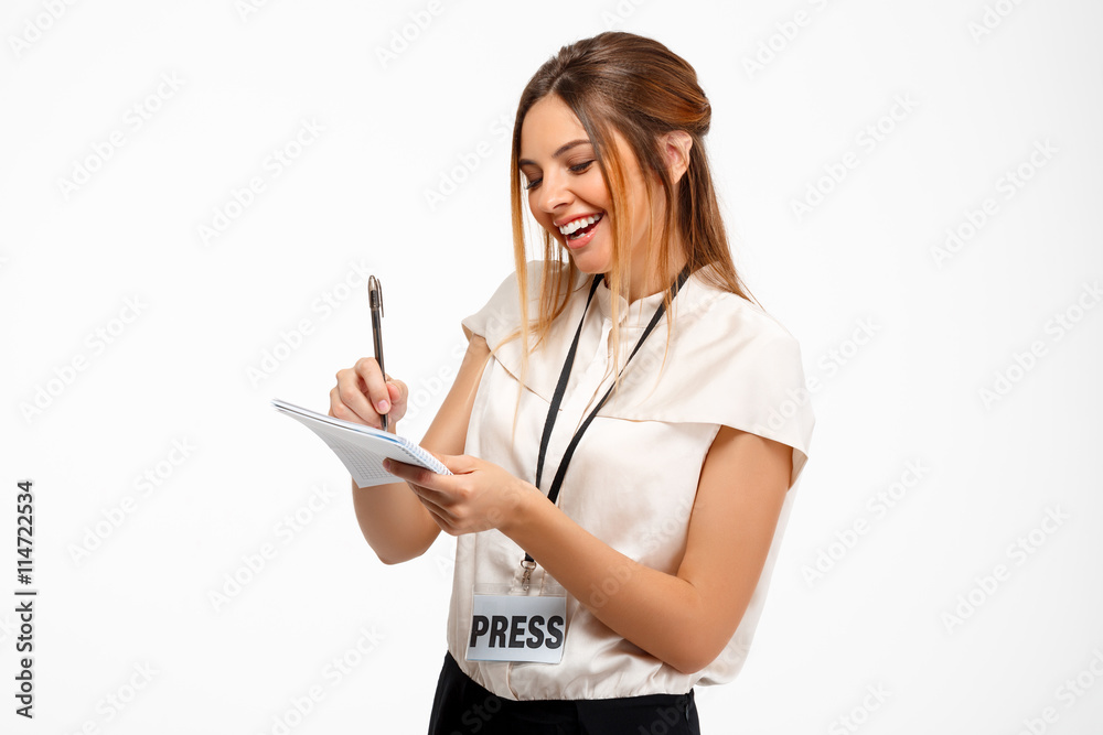 Portrait of young successful businesswoman over white background. Portrait of young successful businesswoman over white background.