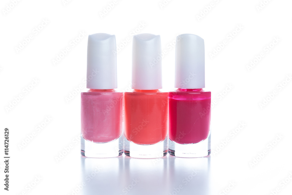 Group of bright nail polishes isolated on white