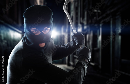 Canvas-taulu Thief holding a crowbar
