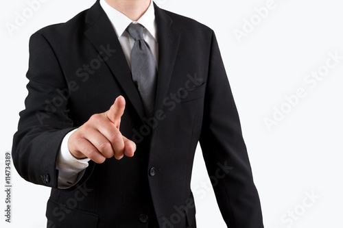 Business man pointing finger at you, isolated on white background