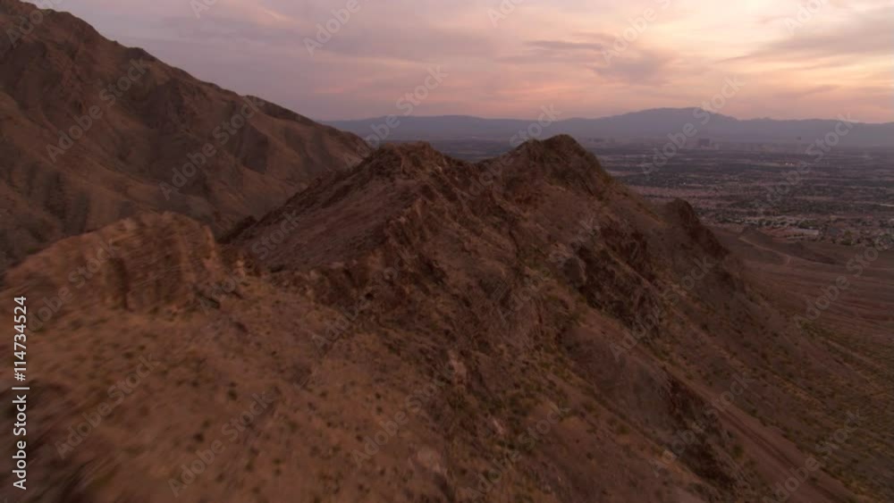 Flying above Sunrise Mountain with Las Vegas in distance Flying above Sunrise Mountain with Las Vegas in distance
