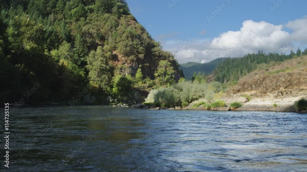 Rafting through mild rapids on the Rogue River, Oregon Rafting through mild rapids on the Rogue River, Oregon