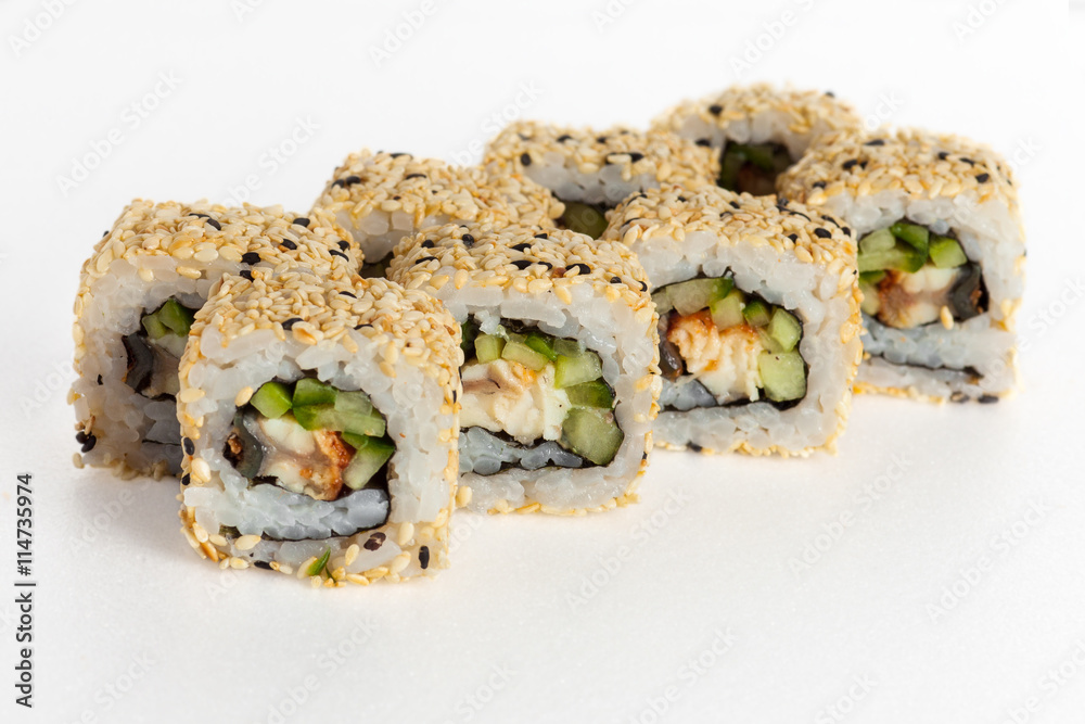 Sushi rolls on a white background with fish, avocado, cheese, and sesame seeds