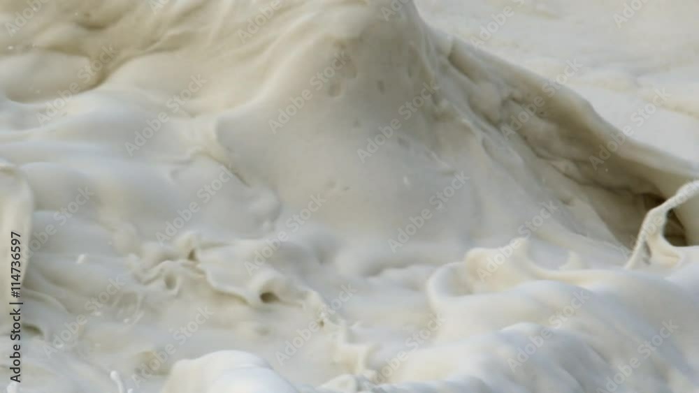 Close-up creamy turbulent surf Close-up creamy turbulent surf