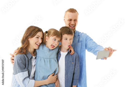 Happy family taking selfie ...