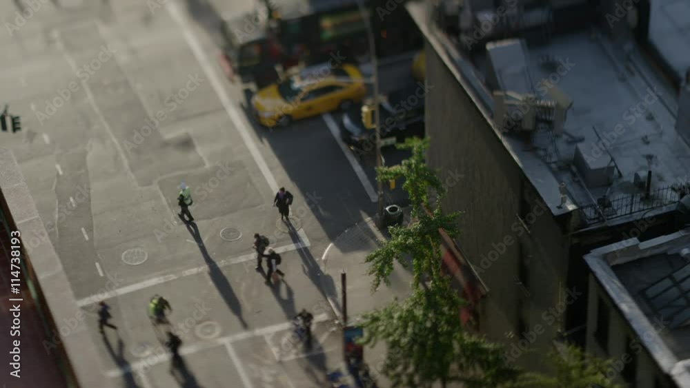 High angle wide time lapse shot of flagger directing traffic / New York, New York, United States High angle wide time lapse shot of flagger directing traffic / New York, New York, United States