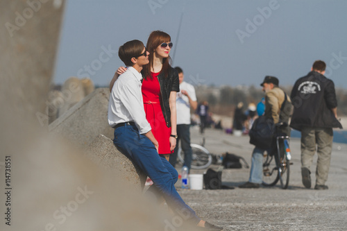 Image of beautiful couple posing on the sea
