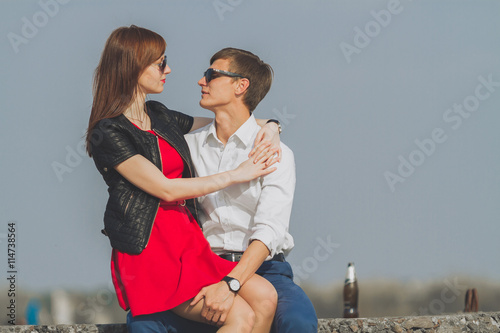 Image of beautiful couple posing on the sea