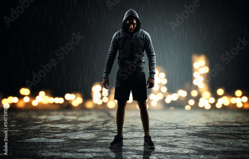 Man with hoodie on the street