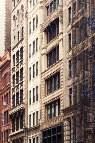 Typical exterior facade of old New York City apartment buildings
