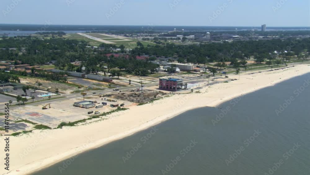 Flight past a large building destroyed by Hurricane Katrina