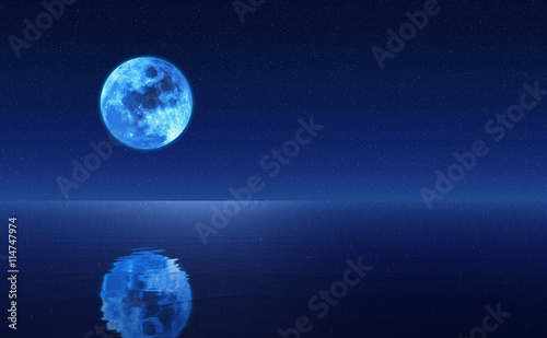 Full moon over cold night water