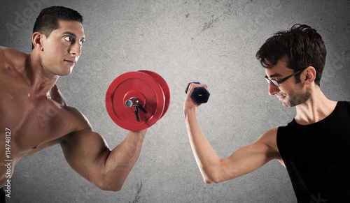 Obraz na płótnie Ironic comparison of muscle strength