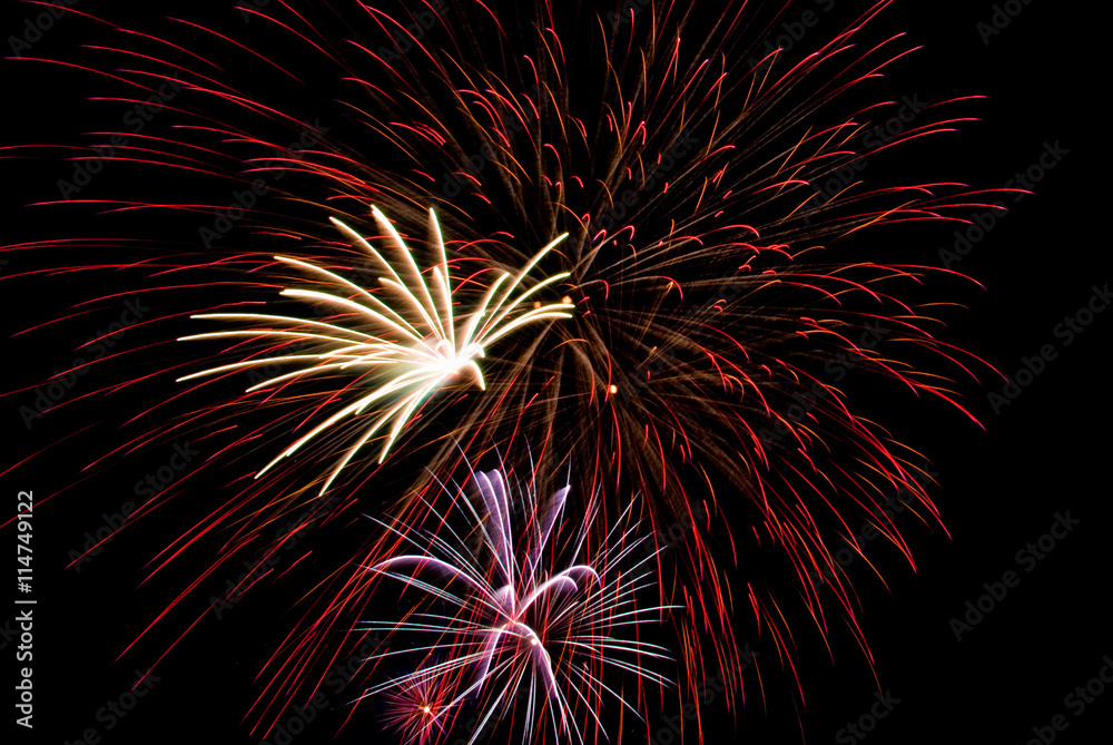 Fireworks explosions in the night sky Fireworks explosions in the night sky