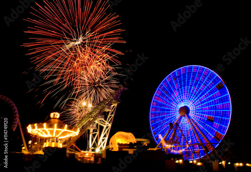 Fireworks explosions in the night sky above the amusemant pier in Wildwood, New Jersey