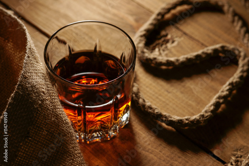 Canvas Print Glass of whiskey and rope