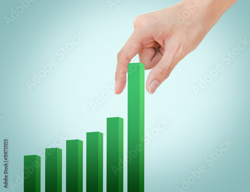 Hand pulling up green graph