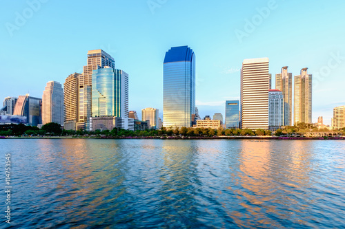 Bangkok city downtown at dusk with reflection of skyline