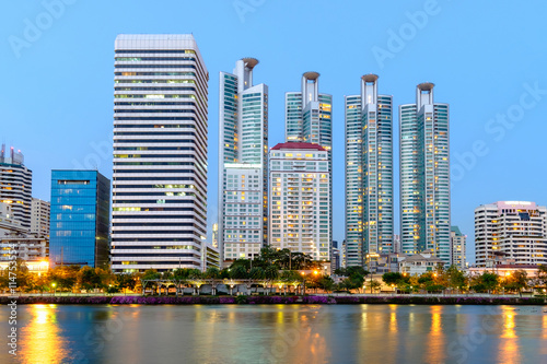 Night cityscape, office buildings and apartments in Thailand at