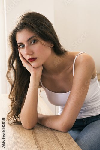 Blue-eyed beautiful girl looking at camera Free Download Blue-eyed beautiful girl looking at camera - GFXLoad