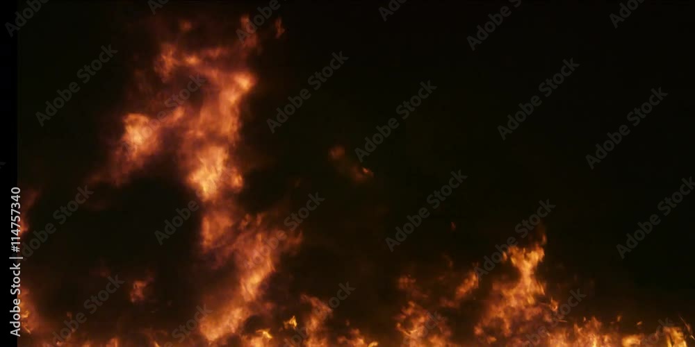 Black smoke and swirling flames gradually rise to fill the frame Black smoke and swirling flames gradually rise to fill the frame