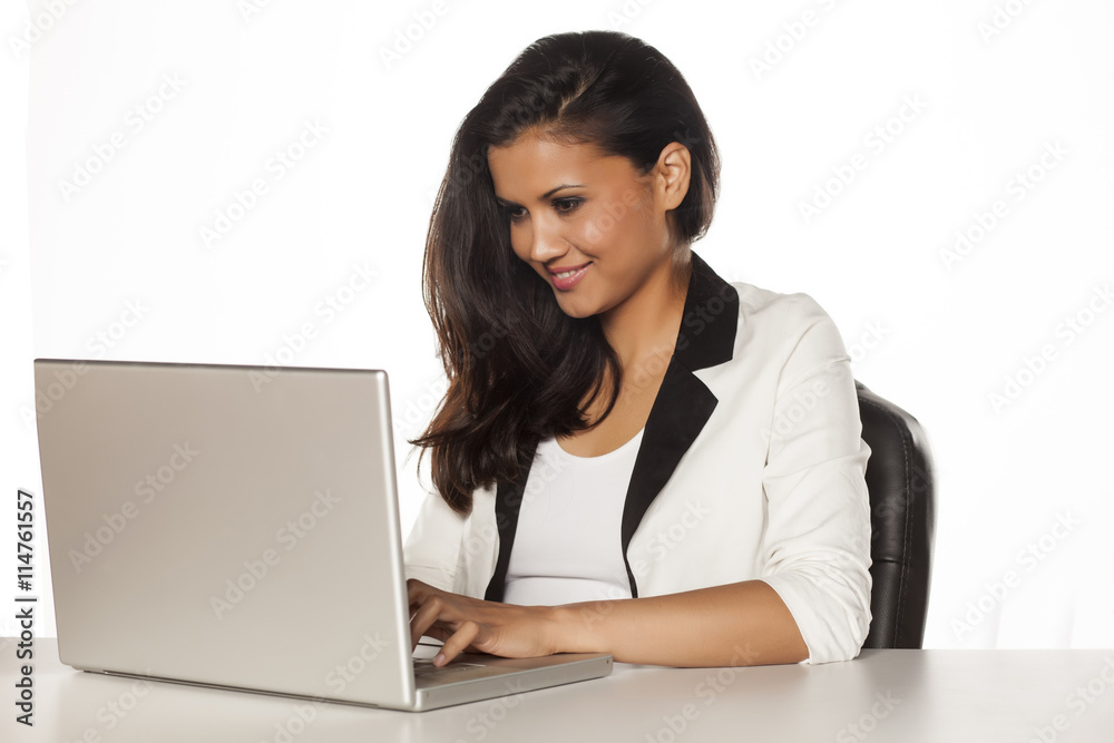 beautiful business woman working on her laptop beautiful business woman working on her laptop