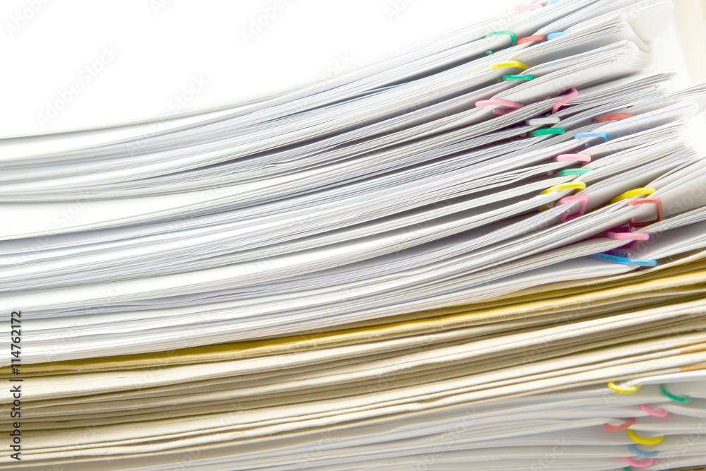 White document and paperclip place switching with brown envelope White document and paperclip place switching with brown envelope