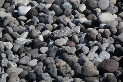 coastal pebbles and water