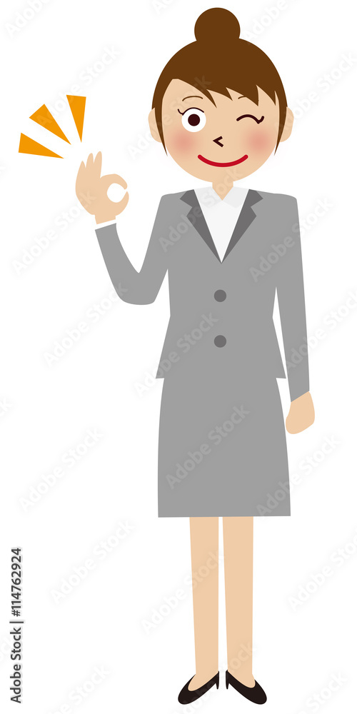 灰色のスーツの女性 OKポーズ 灰色のスーツの女性 OKポーズ