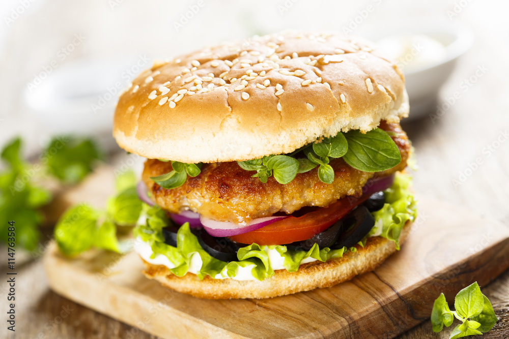 Burger with chicken and olives Burger with chicken and olives