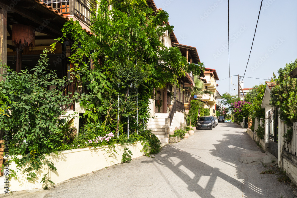 Street in Pefkohori village Street in Pefkohori village