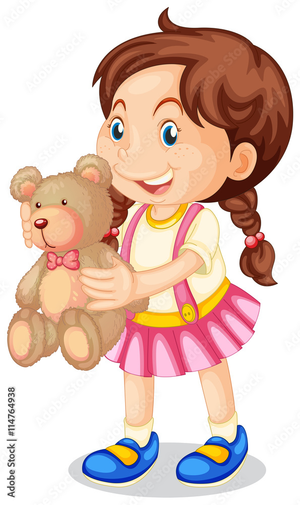 Girl holding brown teddy bear