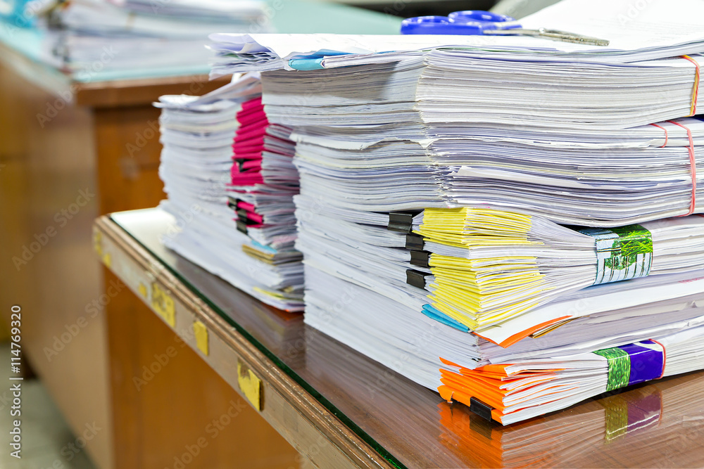 Fototapeta premium Close up of business documents stack on desk , report papers stack