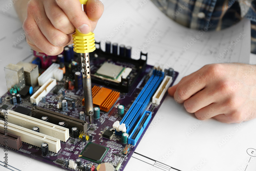 Man hands repair computer parts Man hands repair computer parts