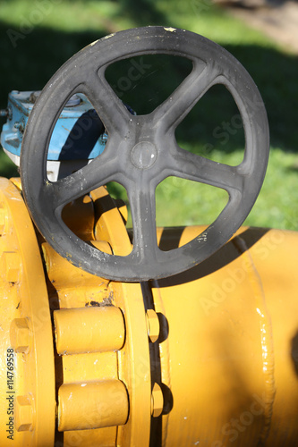 large gas pipeline with well tightened bolts and the shut-off va photo