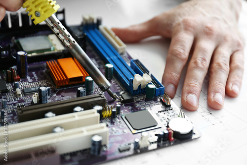 Man hands repair computer p...