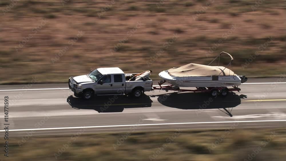 Flight keeping pace with a truck near Page, Arizona