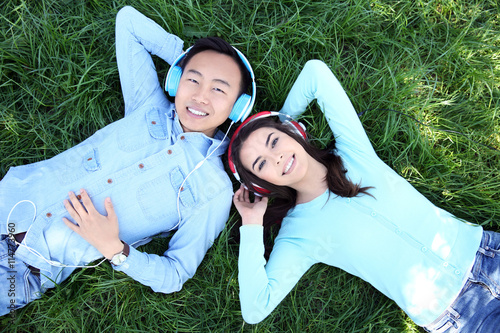 Happy couple with headphone...