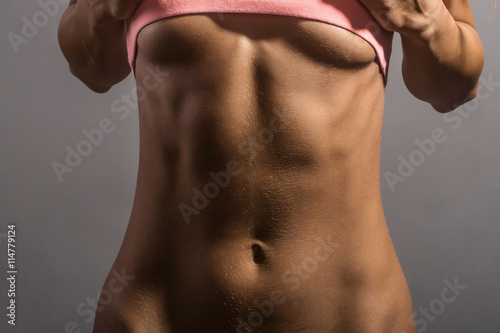 Bild auf Leinwand sexy sporty girl in studio