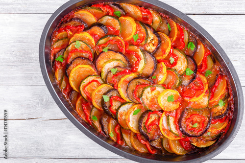 Layered ratatouille in a baking dish, top view