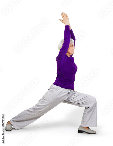 happy charming beautiful elderly woman doing exercises while working out playing sports. On a white background