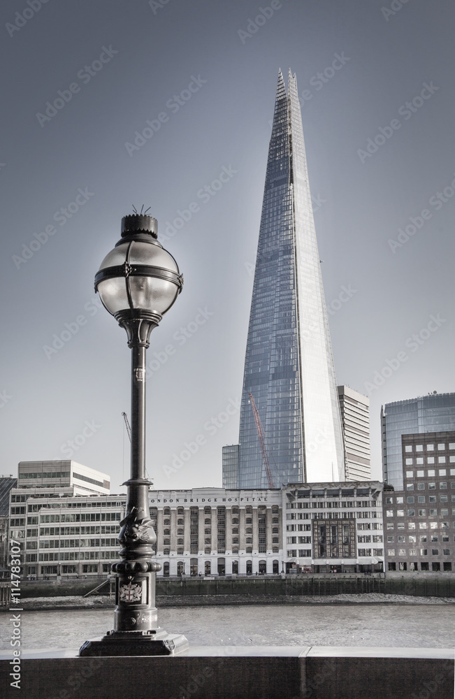 City of London and Shard of glass building. View from the South bank of the river Thames at sunset.  - obrazy, fototapety, plakaty 